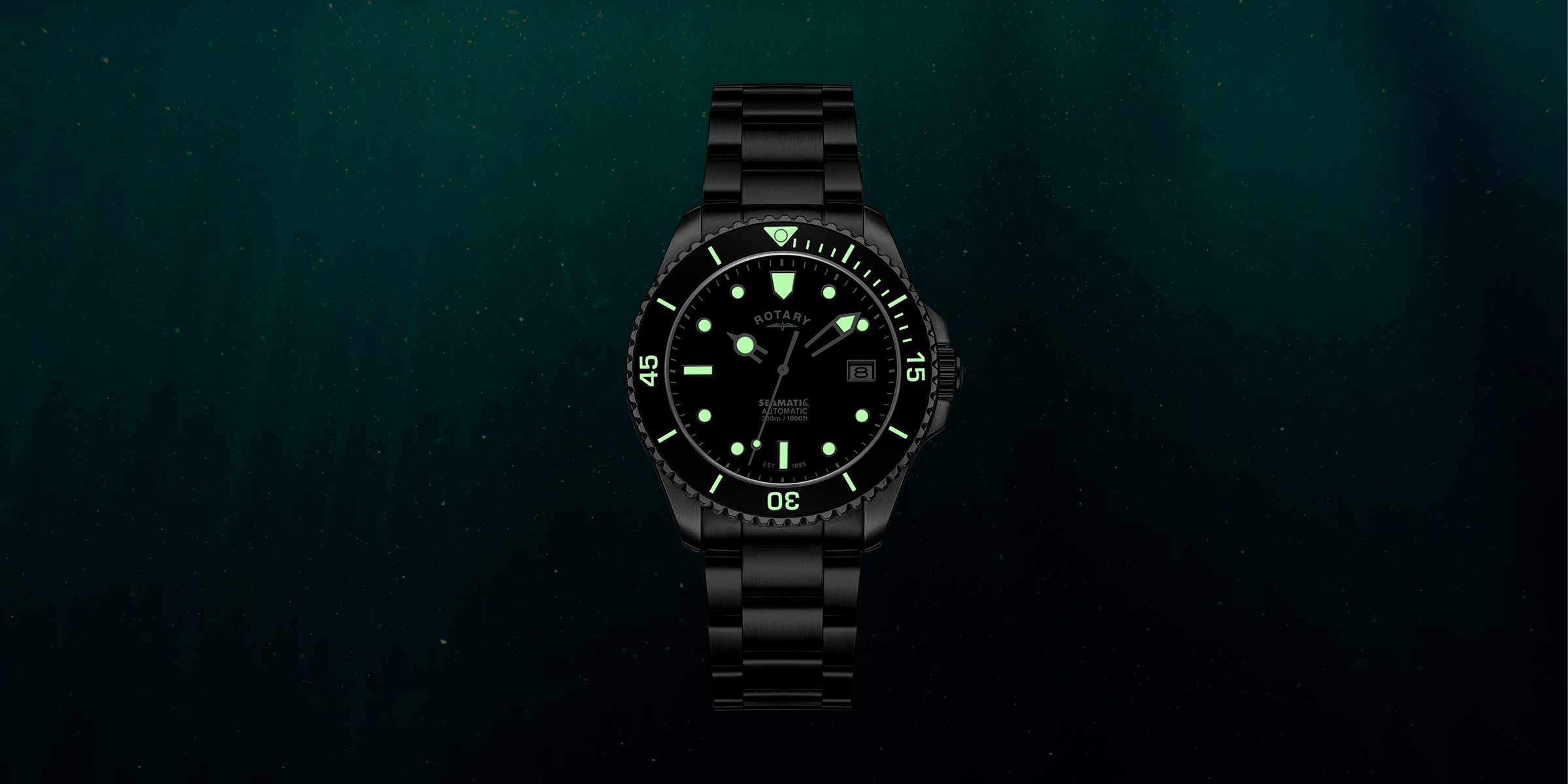 Black watch with glowing face on a dark background