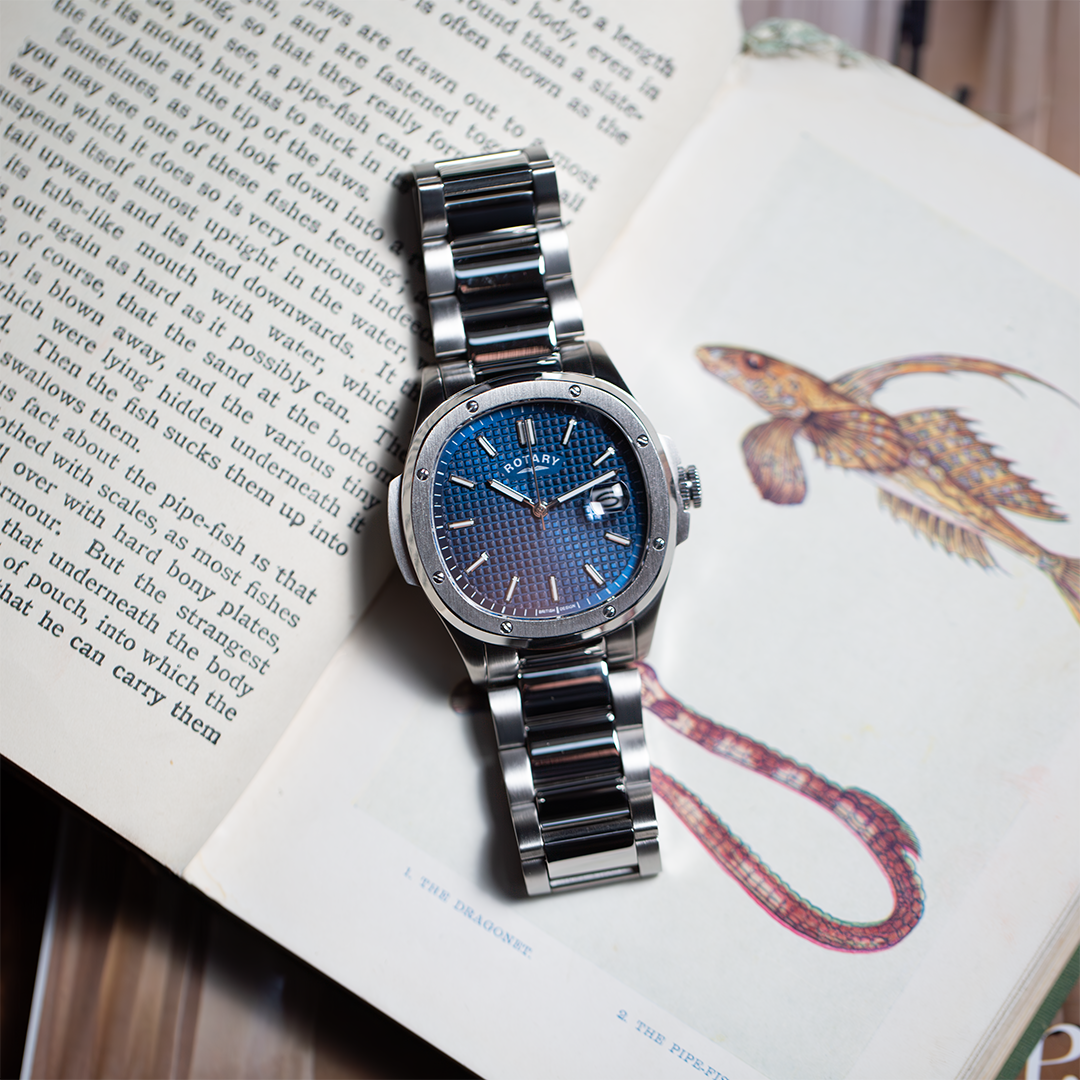 Rotary sport watch in stainless steel with a blue 'waffle' style dial and a 3-link stainless steel bracelet