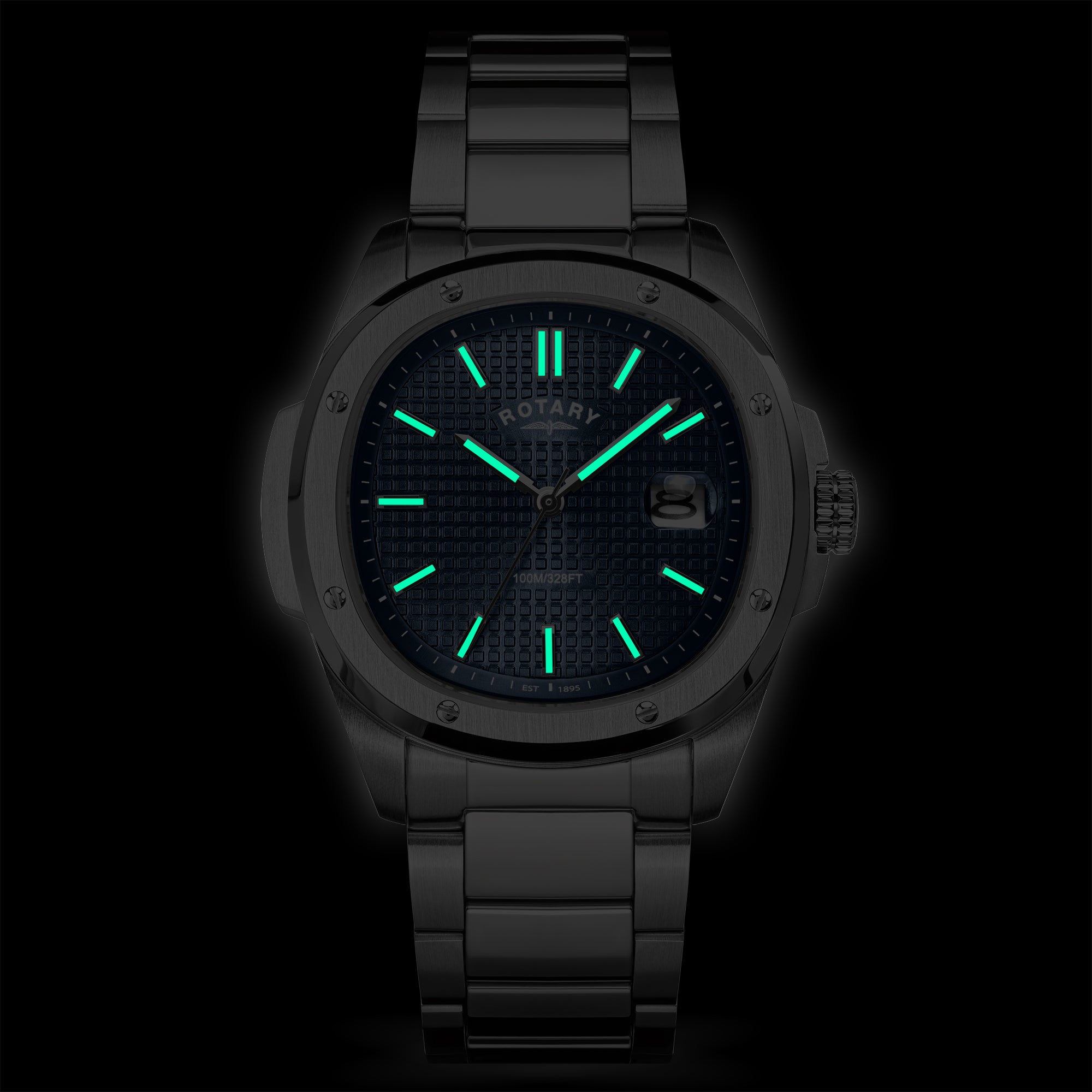 Rotary wristwatch with glowing green face on a black background