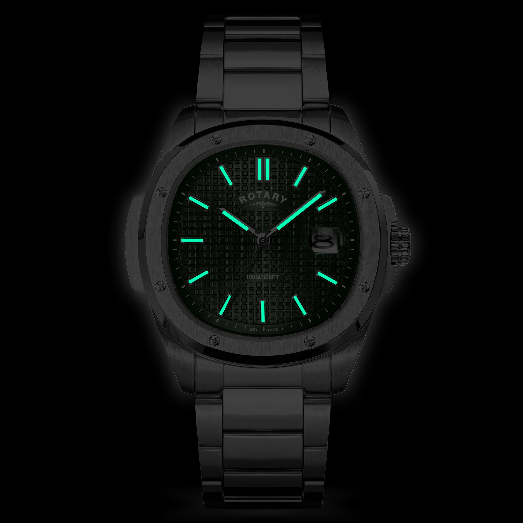 Rotary wristwatch with glowing green face on a dark background