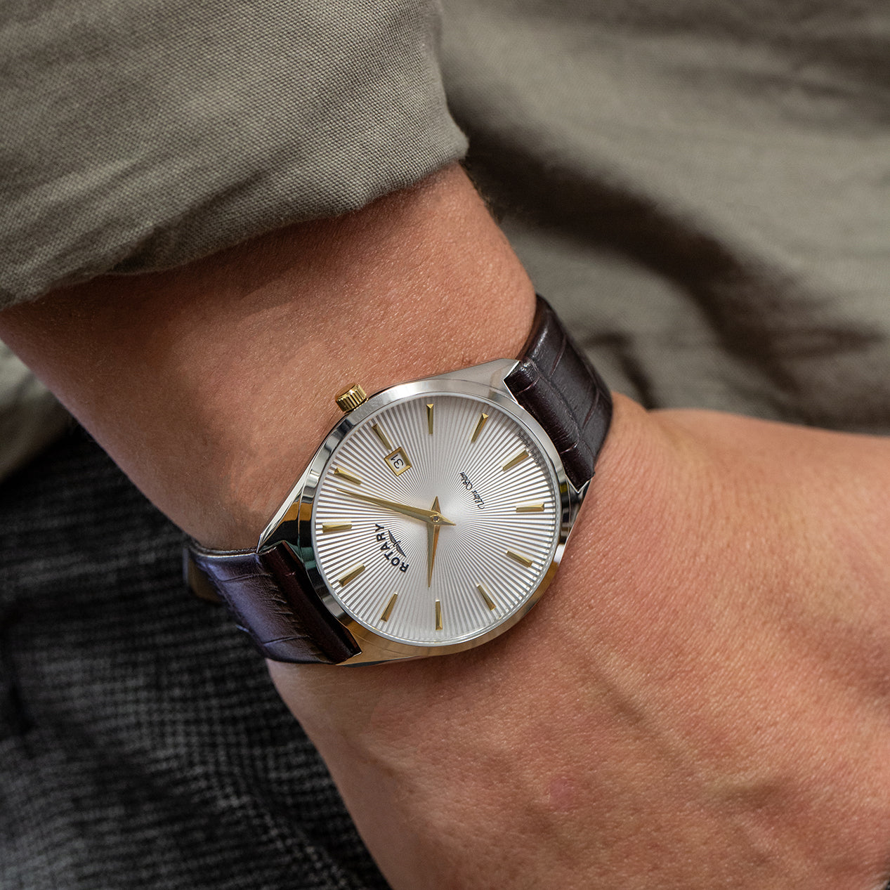 Mens rotary ultra slim watch being worn by a man with a shirt