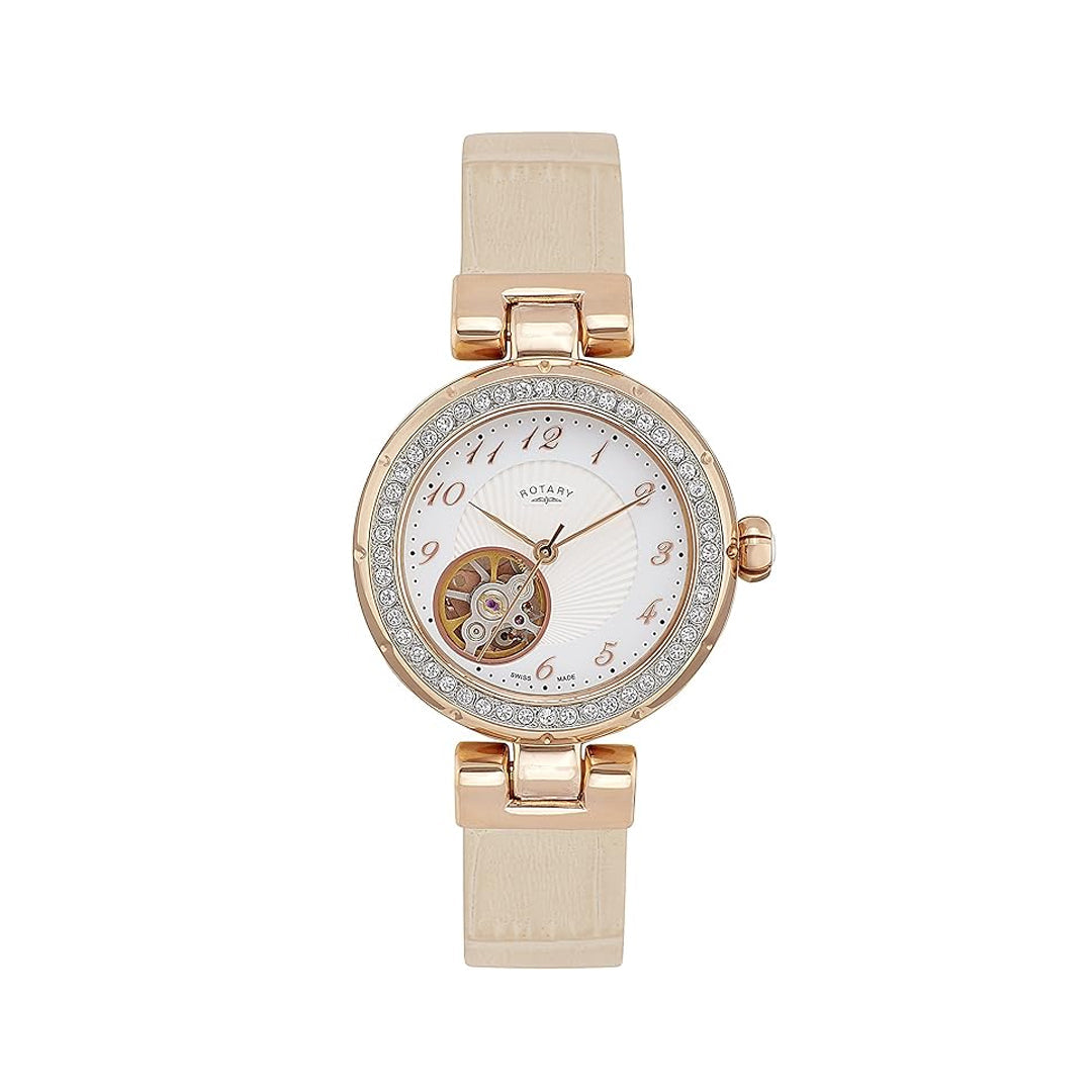 rotary ladies watch in gold with a crystal set bezel, automatic movement with an 'open-heart' to see the mechanism and a cream leather strap