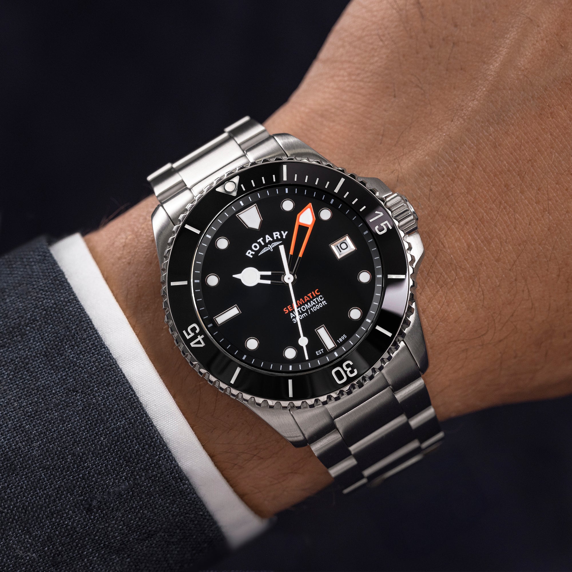 Rotary Seamatic watch on a wrist with a dark background