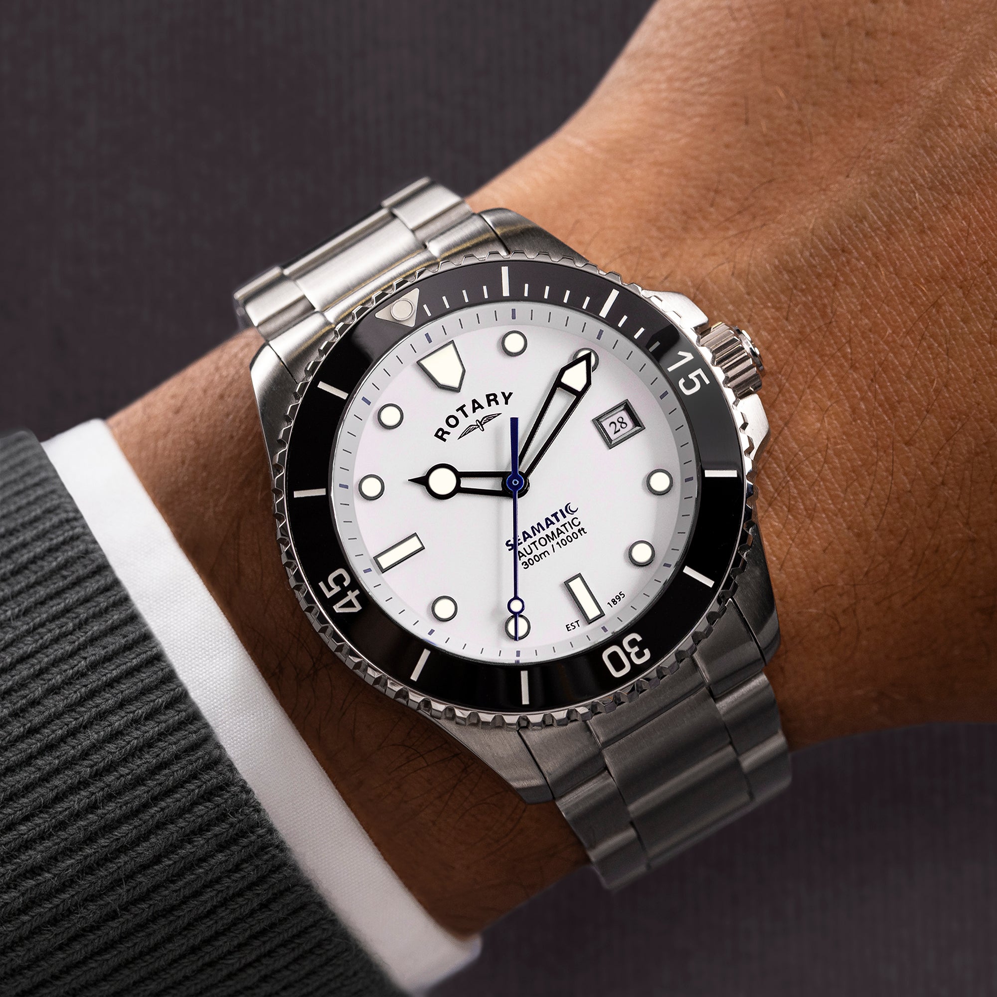Rotary Seamatic watch on a wrist with a dark background