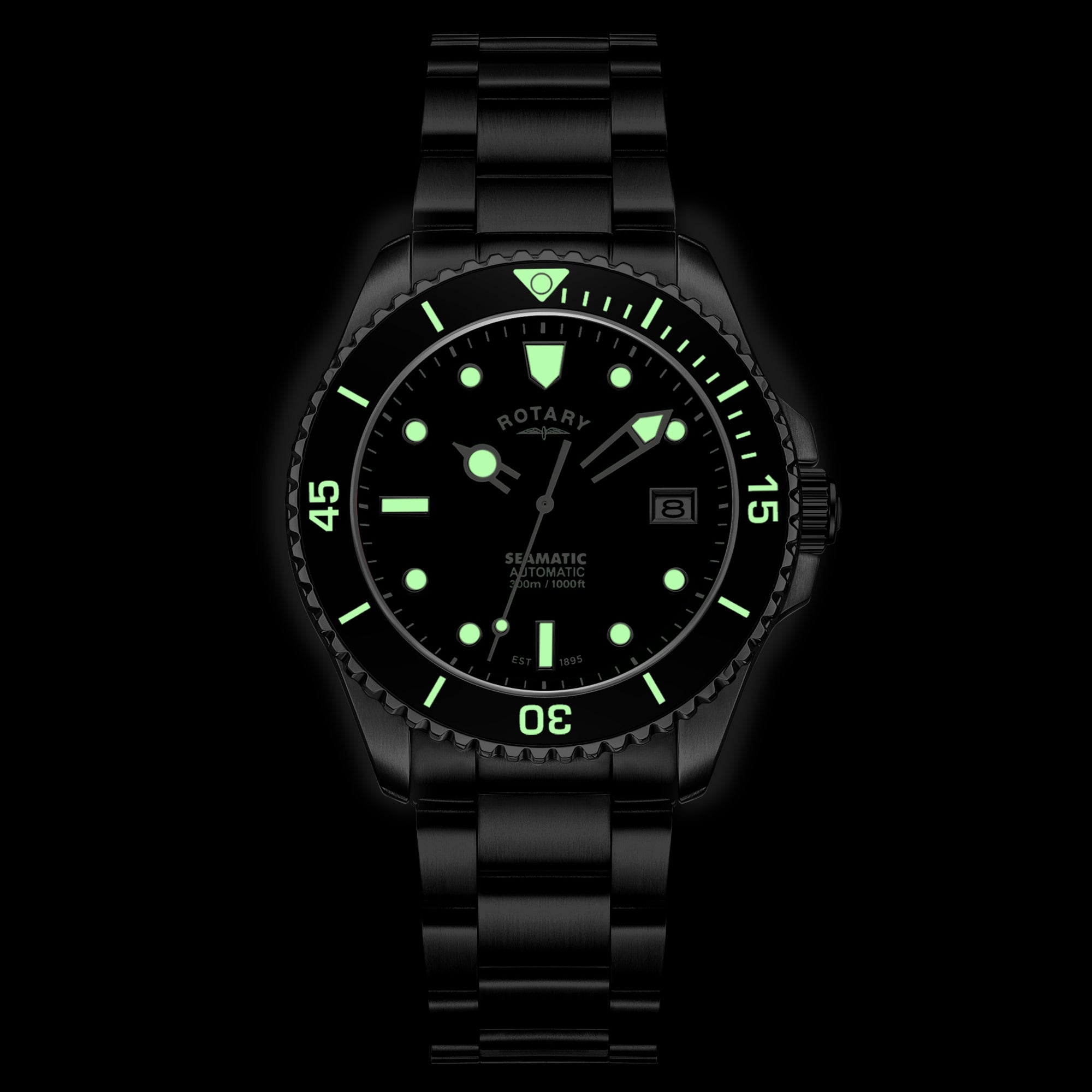 Rotary Seamatic wristwatch with green glowing digits on a black background