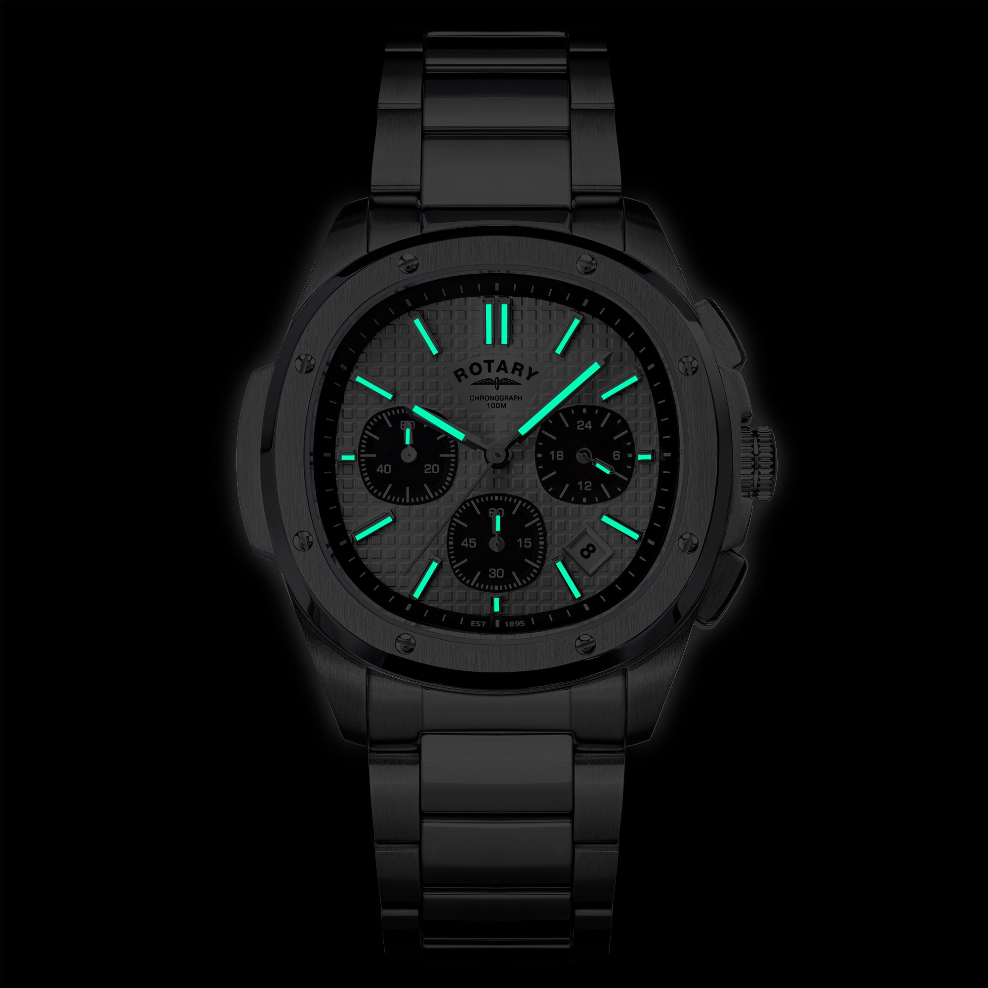 Rotary Apex100 Chronograph watch with glowing green face on a black background