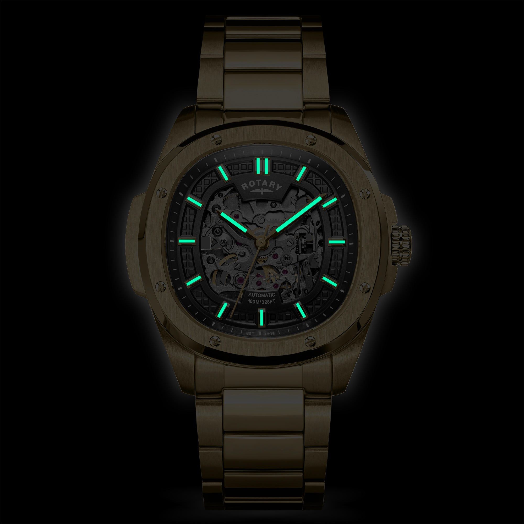 Rotary Apex100 automatic watch with green glowing hands and face on a black background