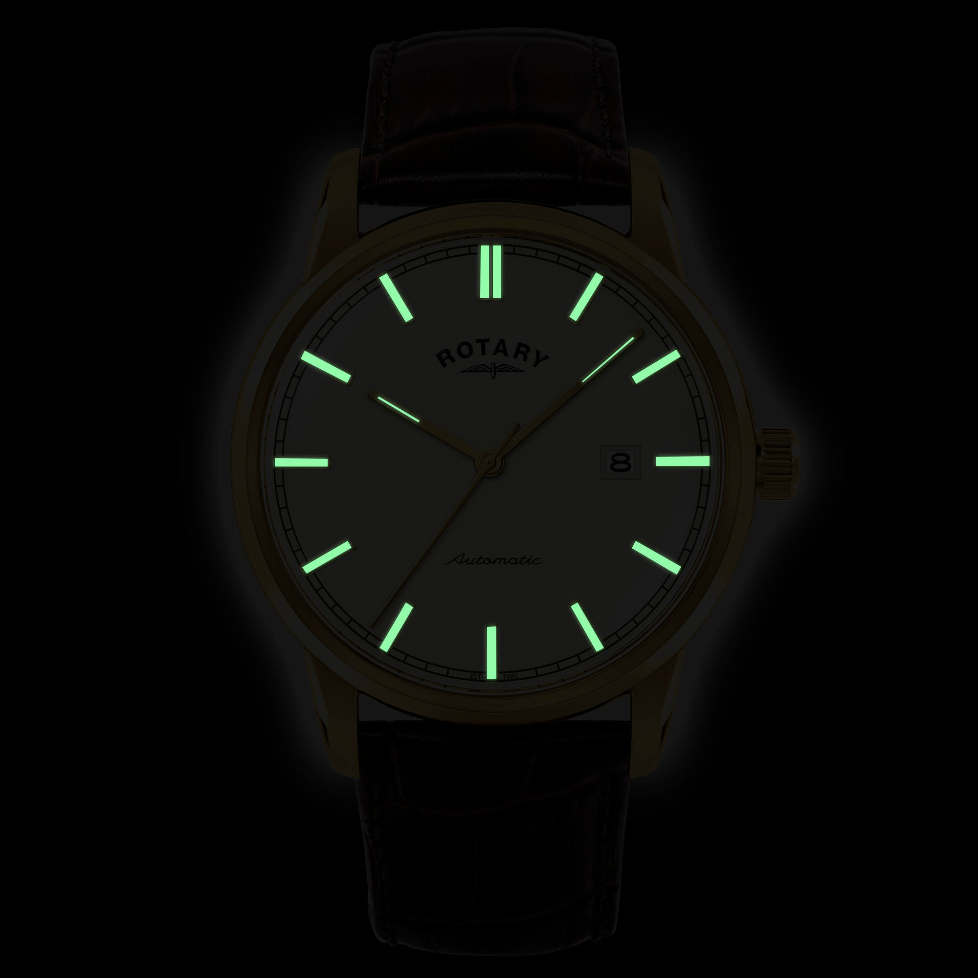 Rotary watch with glowing green hands on a black background
