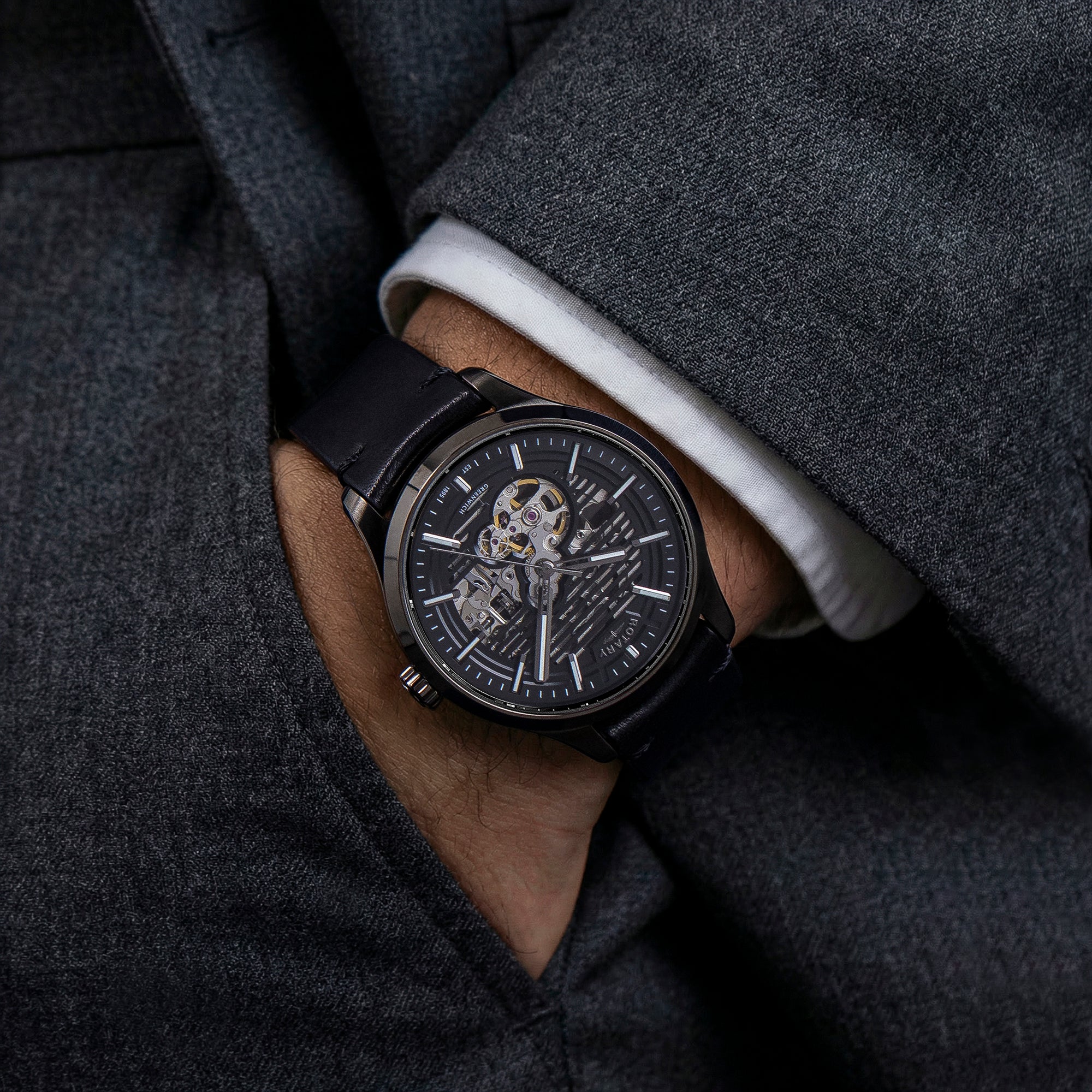 Black Rotary Greenwich GT1 wristwatch on a person wearing a dark coat