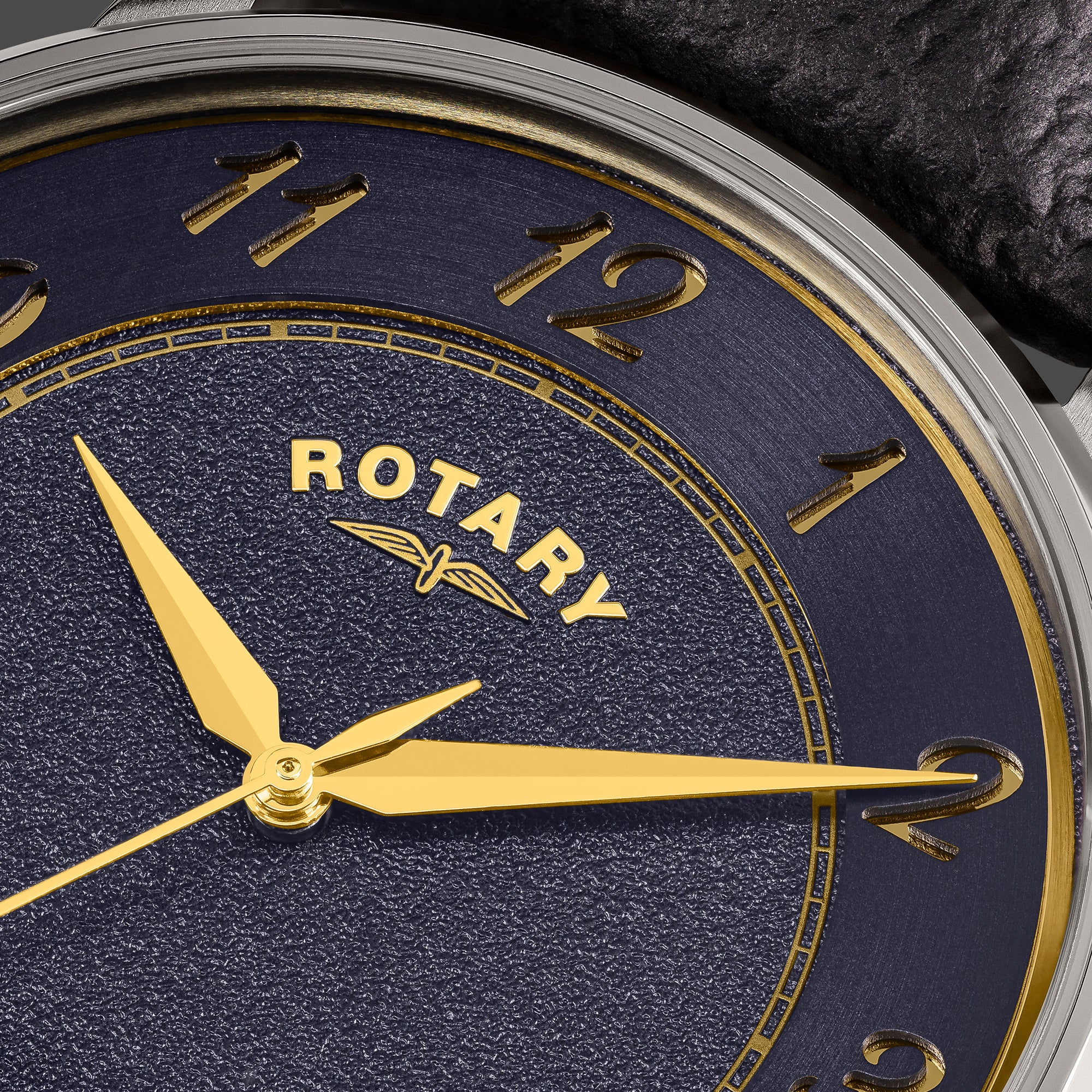 Rotary men's watch with blue dial and black leather strap on a white background