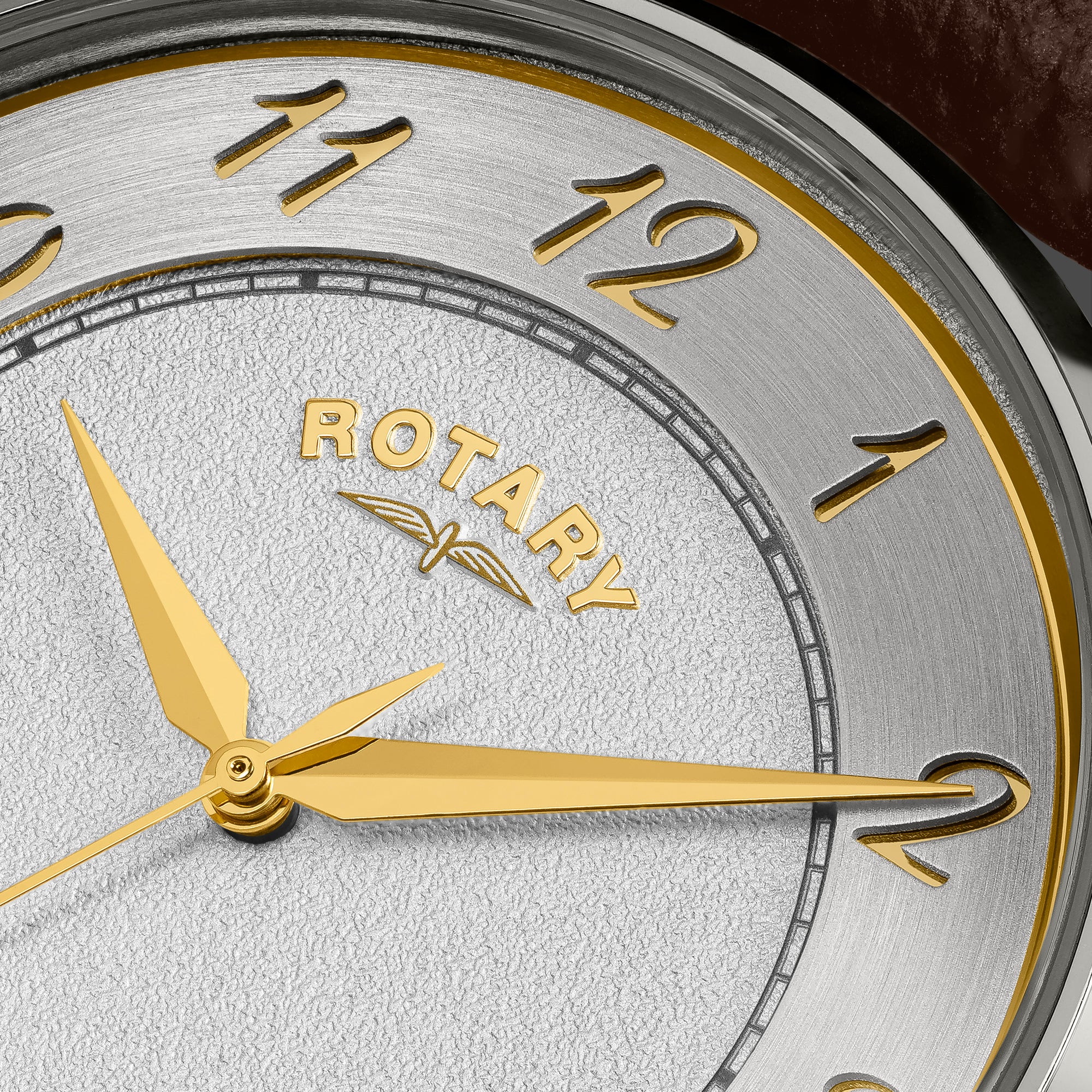 Rotary watch with brown leather strap and silver case on a white background