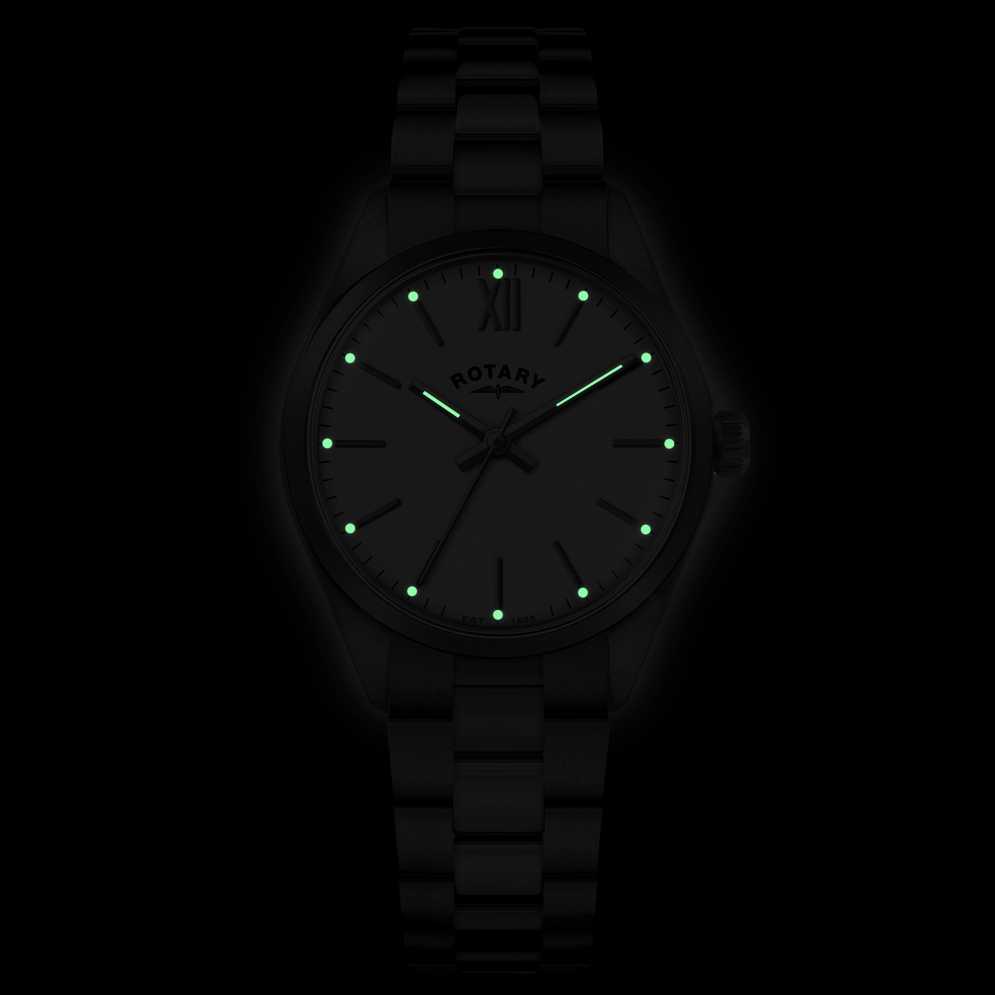 Rotary wristwatch with glowing indices on a black background