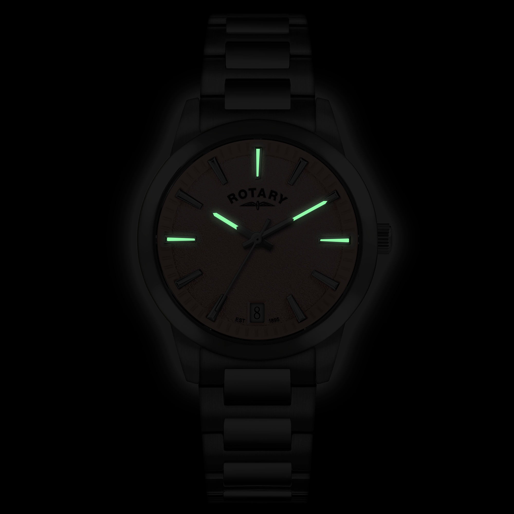 Rotary wristwatch with glowing green hands and markers on a dark background.