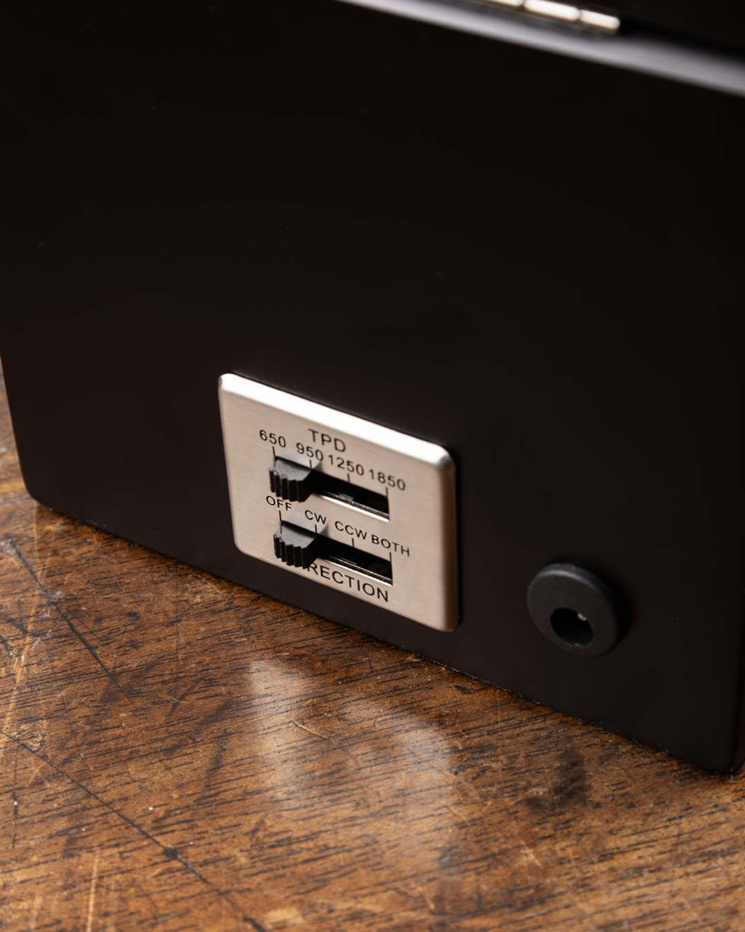 Rotary Watch Winder Control panel with buttons and labels on a black surface