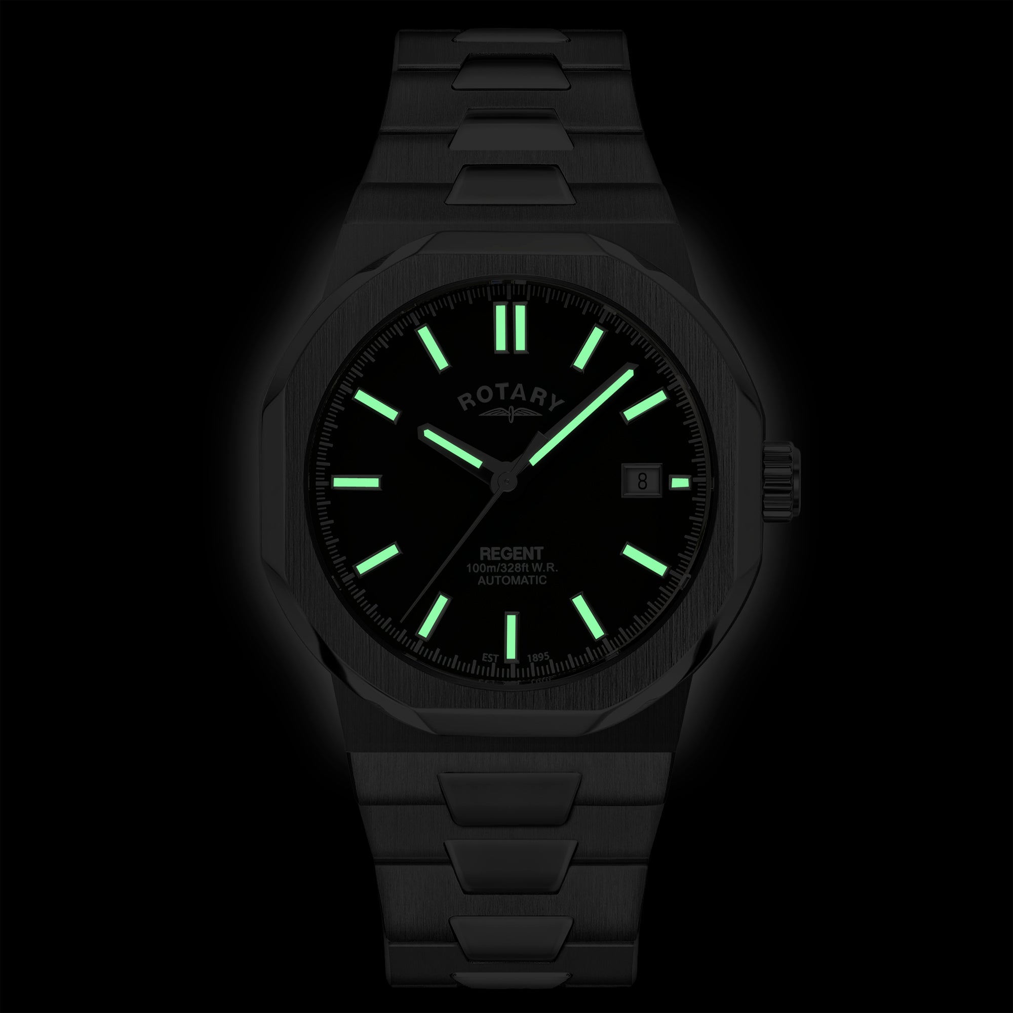 Rotary wristwatch with glowing green face on a black background