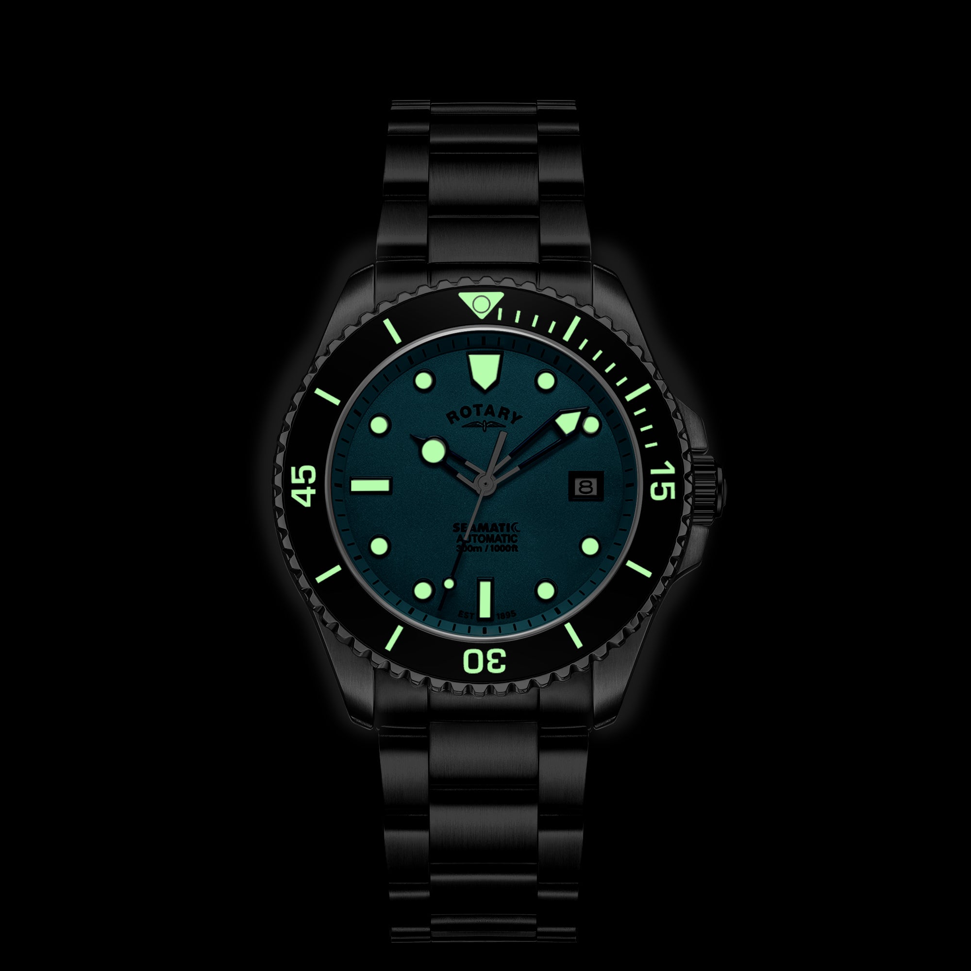 Rotary Seamatic wristwatch with green glowing details on a black background