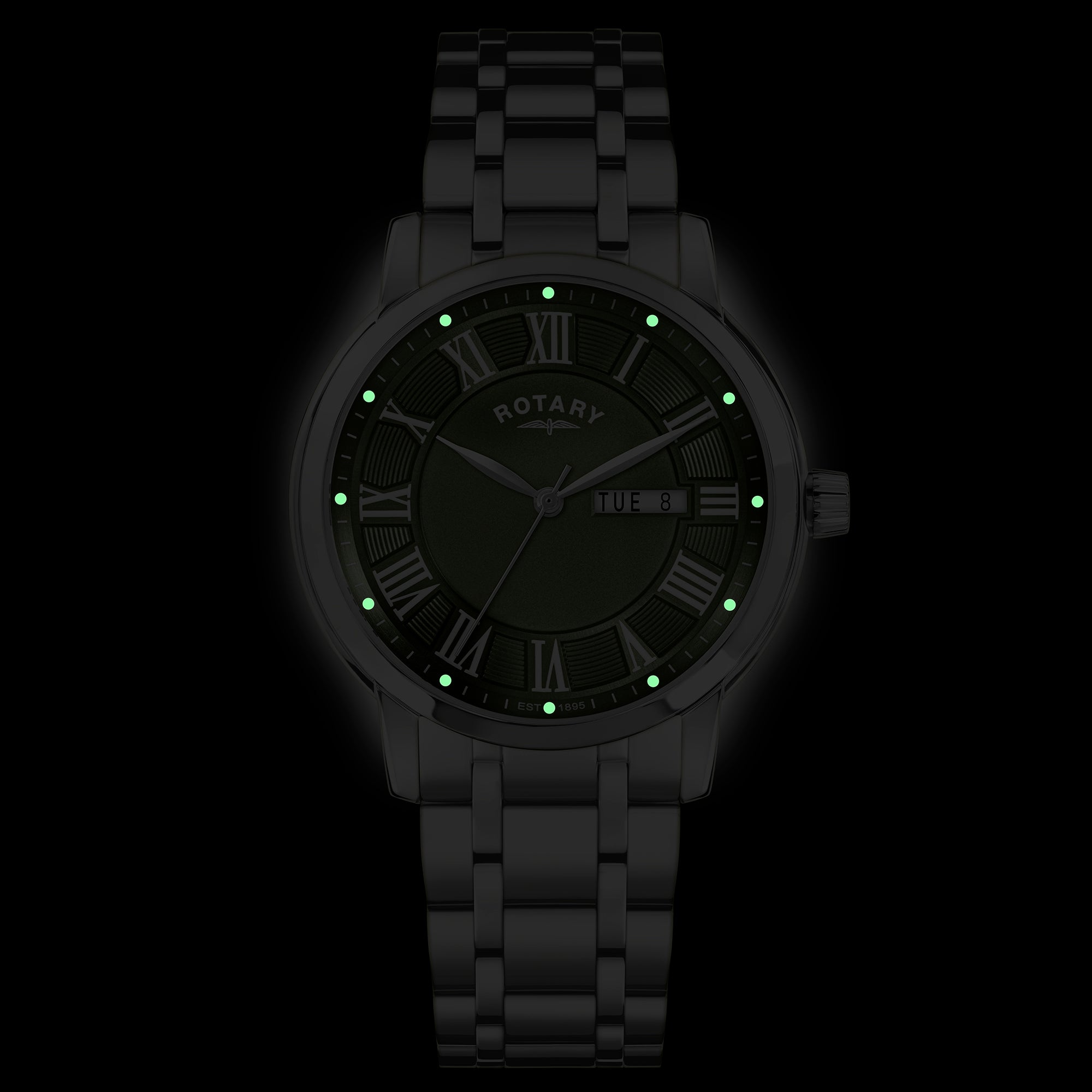Rotary wristwatch with glowing green hour markers on a black background