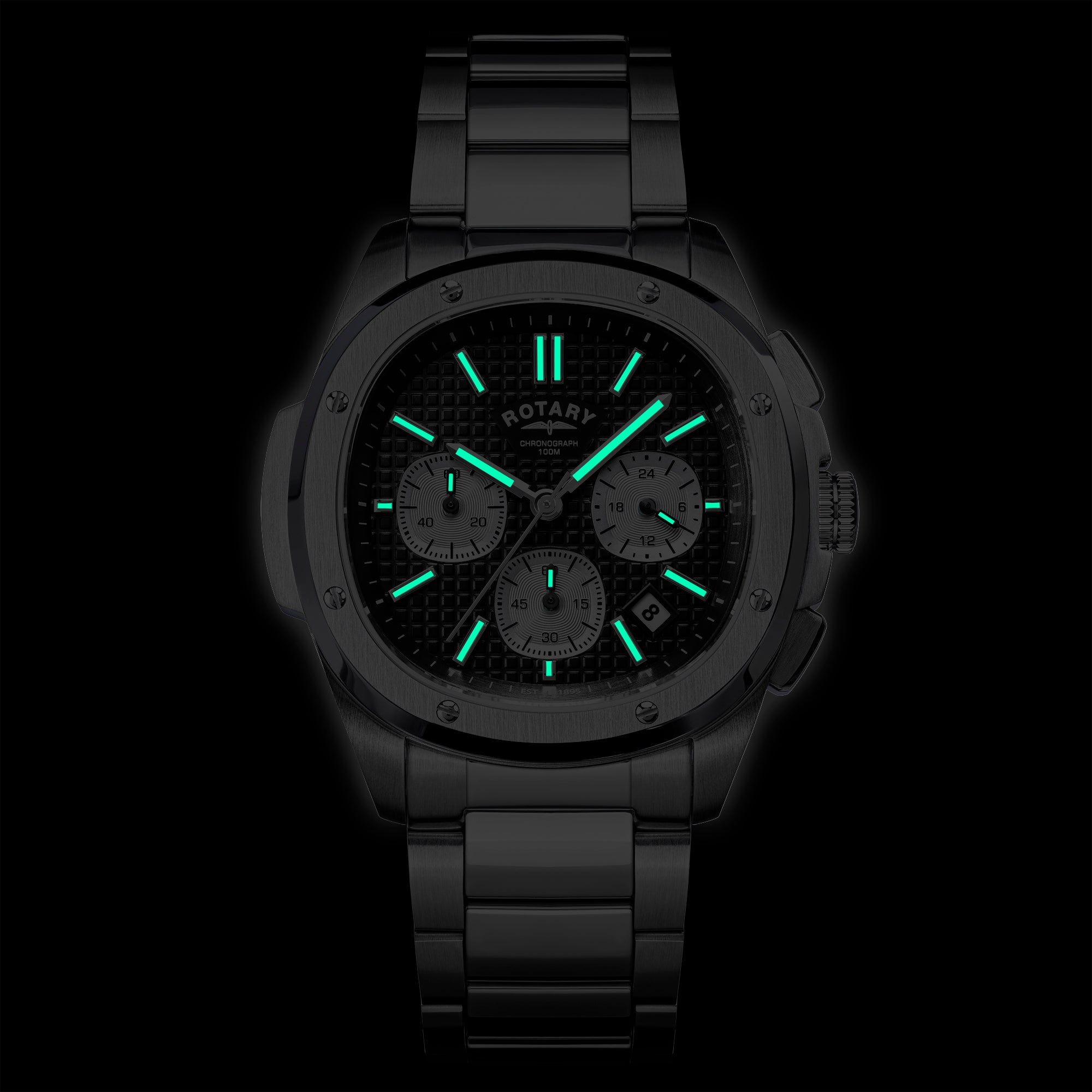 Rotary Apex100 Chronograph watch with glowing green face on a black background