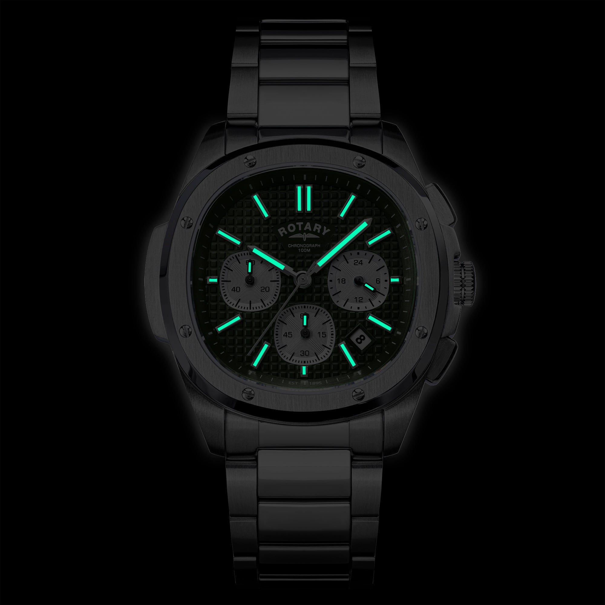 Rotary Apex100 Chronograph watch with glowing green face on a black background