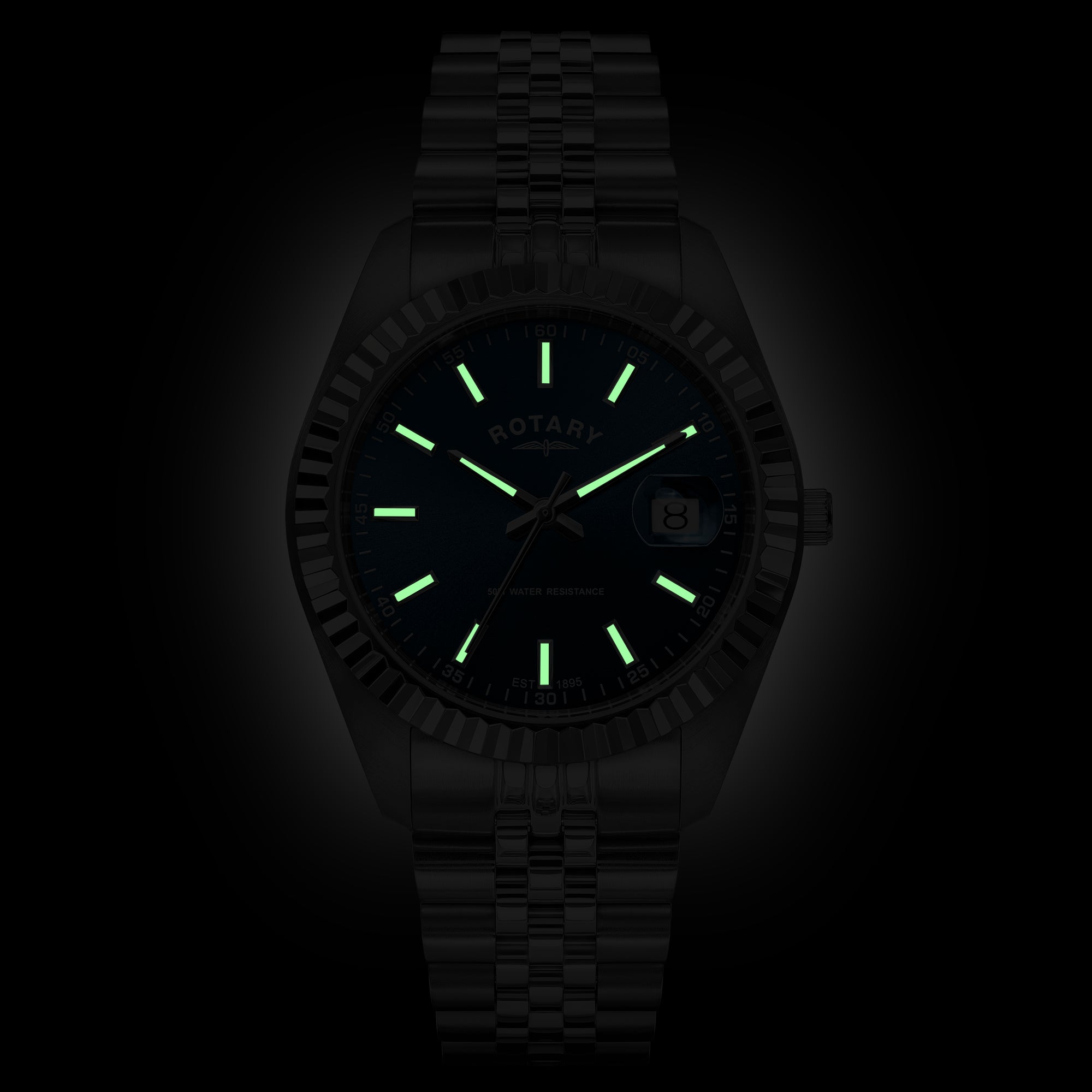 A black Rotary wristwatch with a matching black metal link bracelet, featuring a black dial with bright green luminescent hour markers and hands, shown against a dark background.