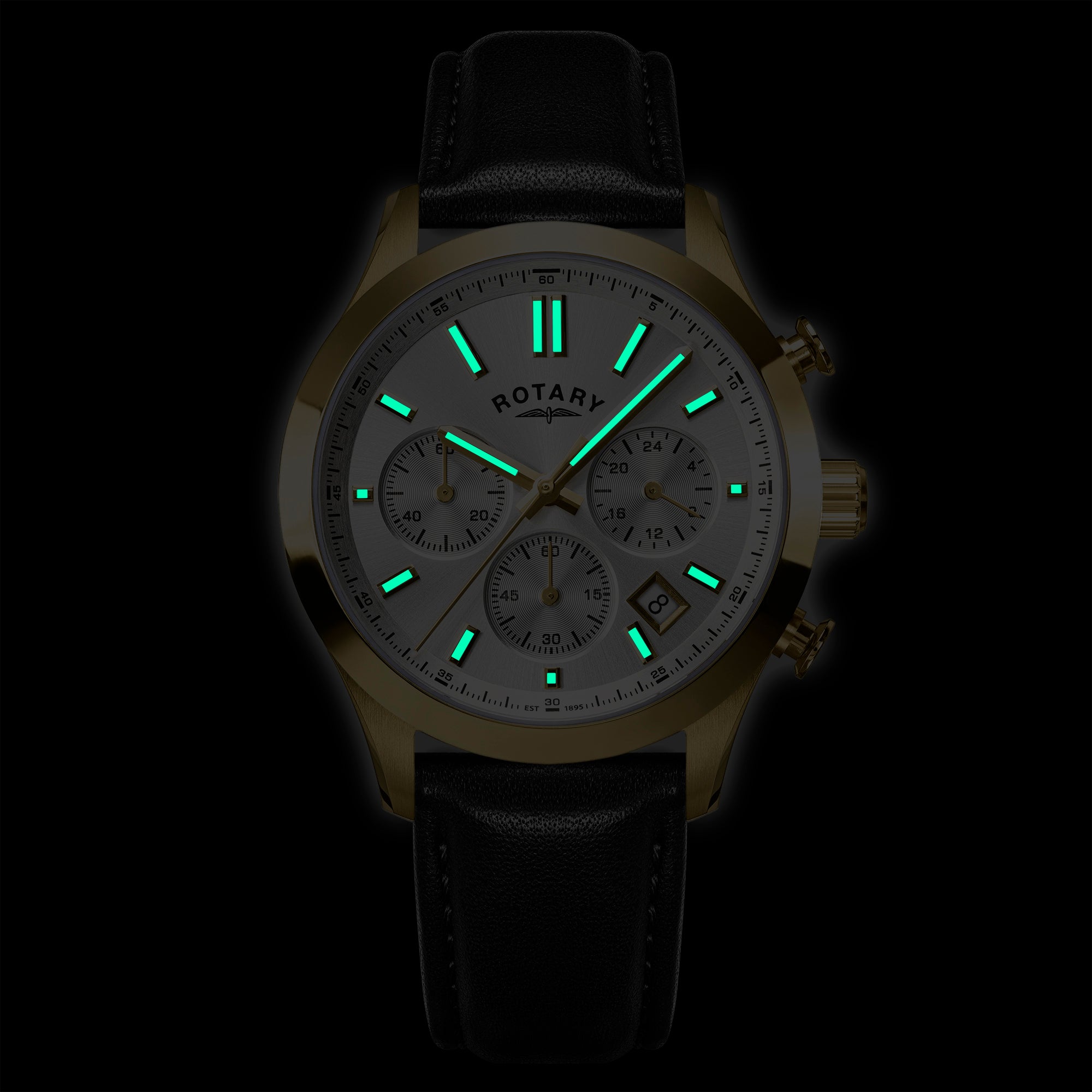 Rotary Heritage Chronograph watch with black leather strap and glowing green face on a dark background