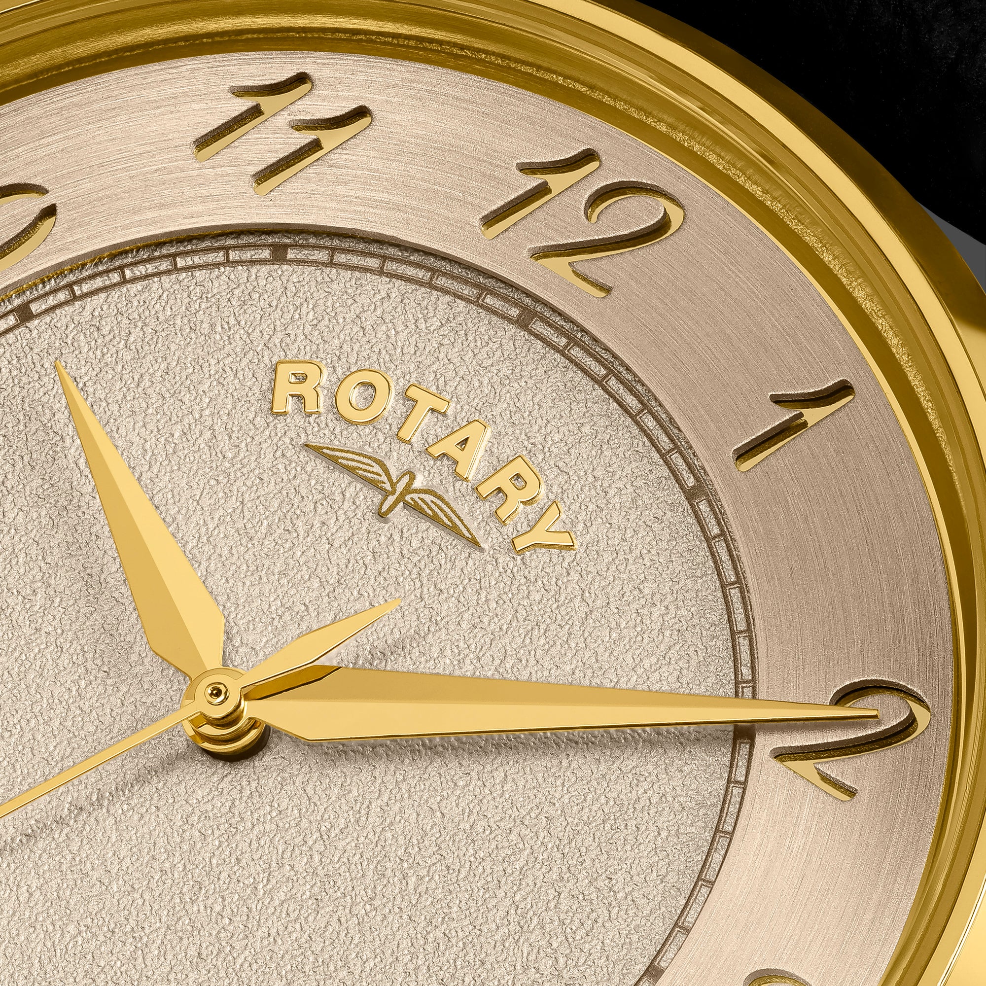 Close-up of a Ladies Rotary Heritage watch face with gold hands and bezel.