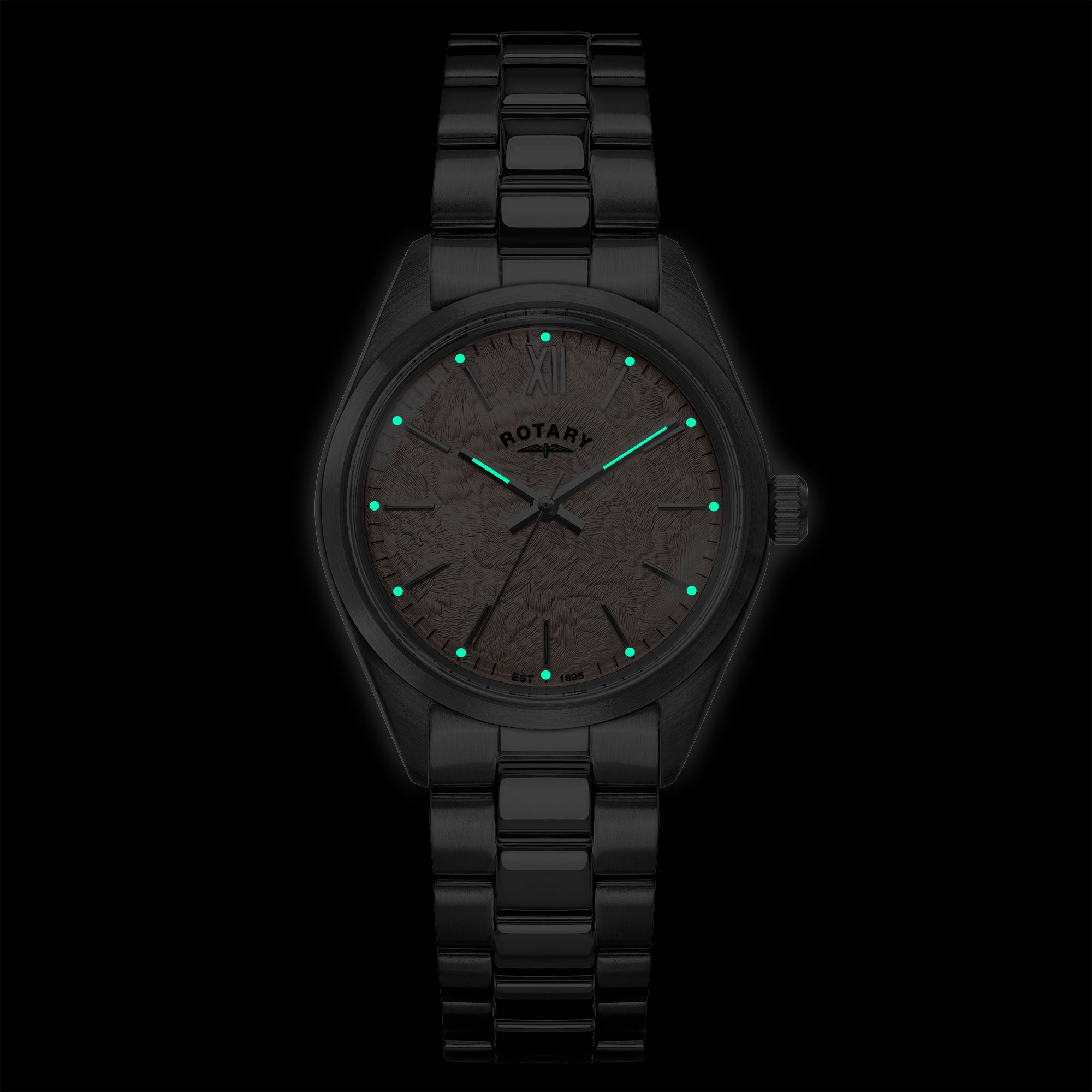 Stainless steel Rotary ladies wristwatch with green glowing accents on a black background