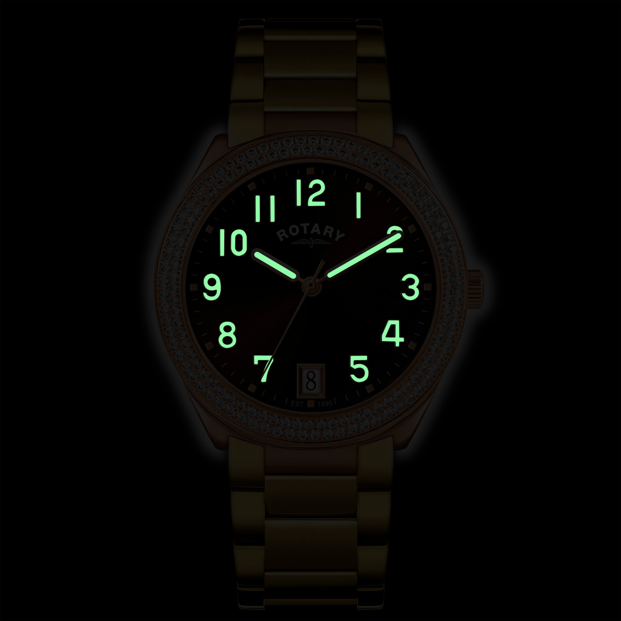 Rotary Brilliance wristwatch with glowing green lume on a black background