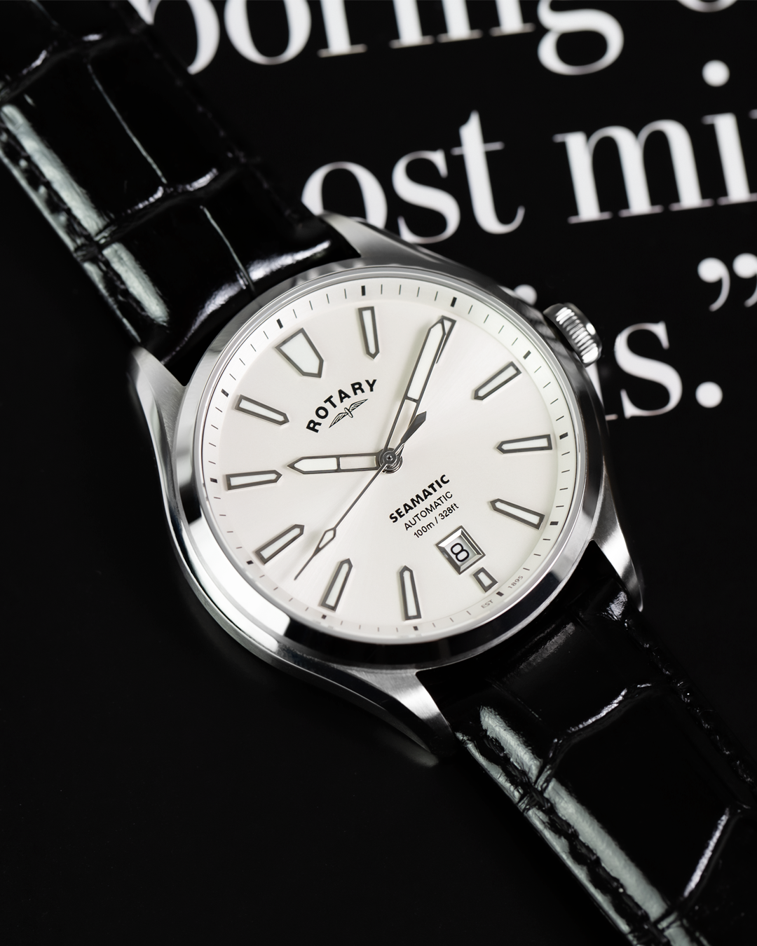 Rotary Seamatic 100 watch with black leather strap on a dark background